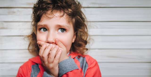 What causes selective mutism to develop